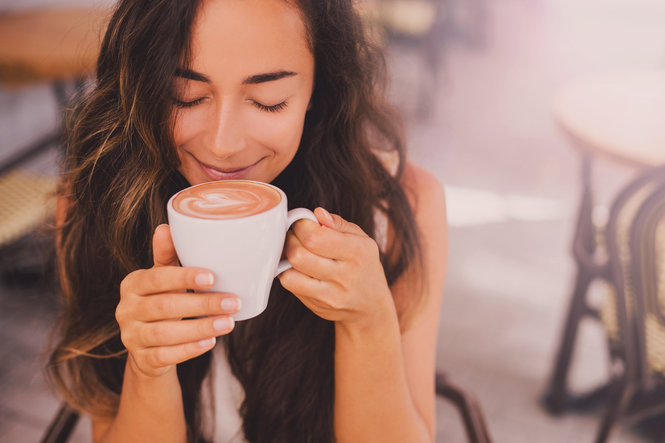 Person enjoying a cup of coffee.