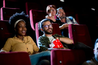 couple watching movie in theater