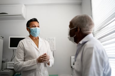 A patient and doctor meet for an appointment