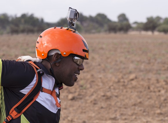 parachuter with action camera on orange helmet. 