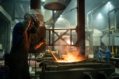 A steel worker in a factory.