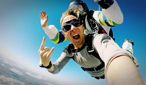 Person skydiving taking a selfie