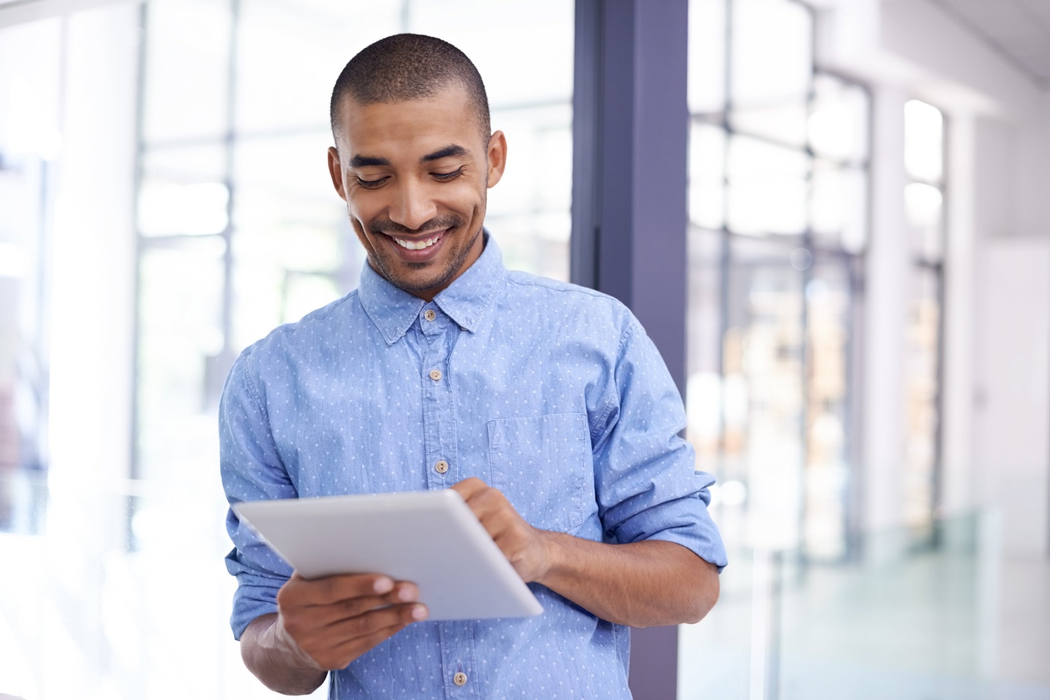 An employee using a tablet device.