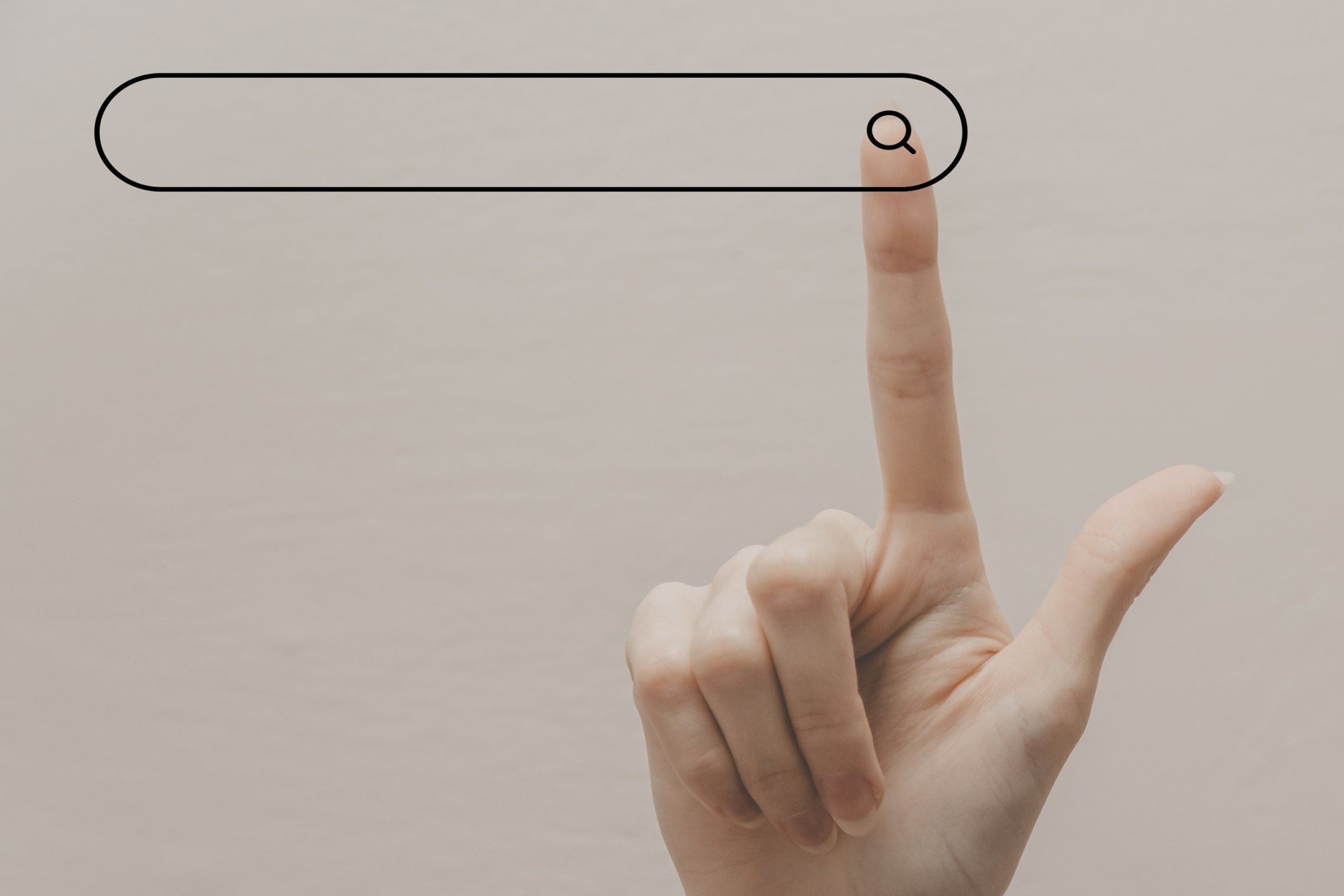 Finger points up to a search bar. 