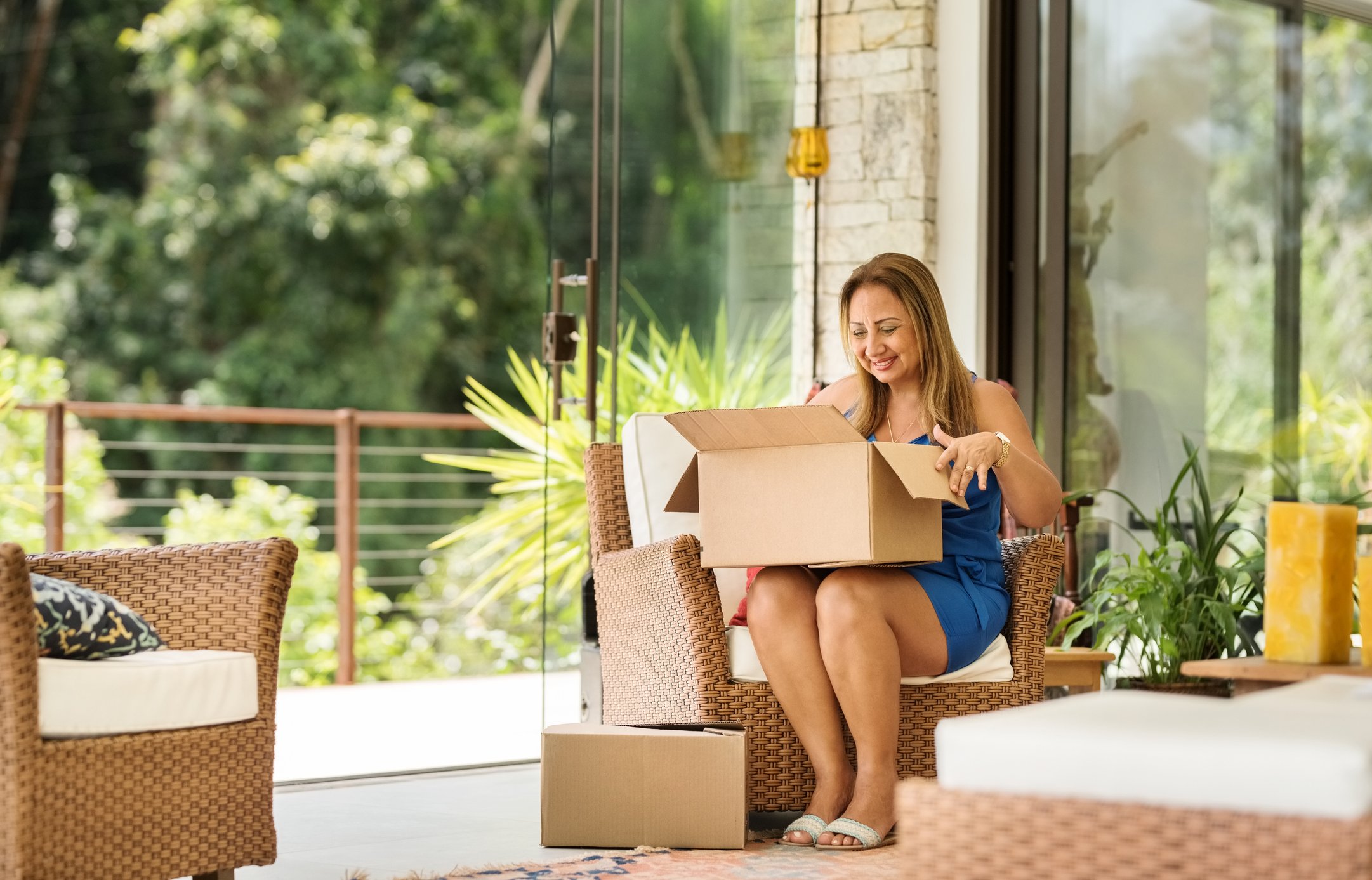 Person unpacking ecommerce delivery.