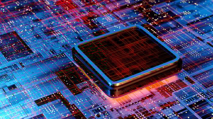 Red and blue 3D semiconductor computer chip.