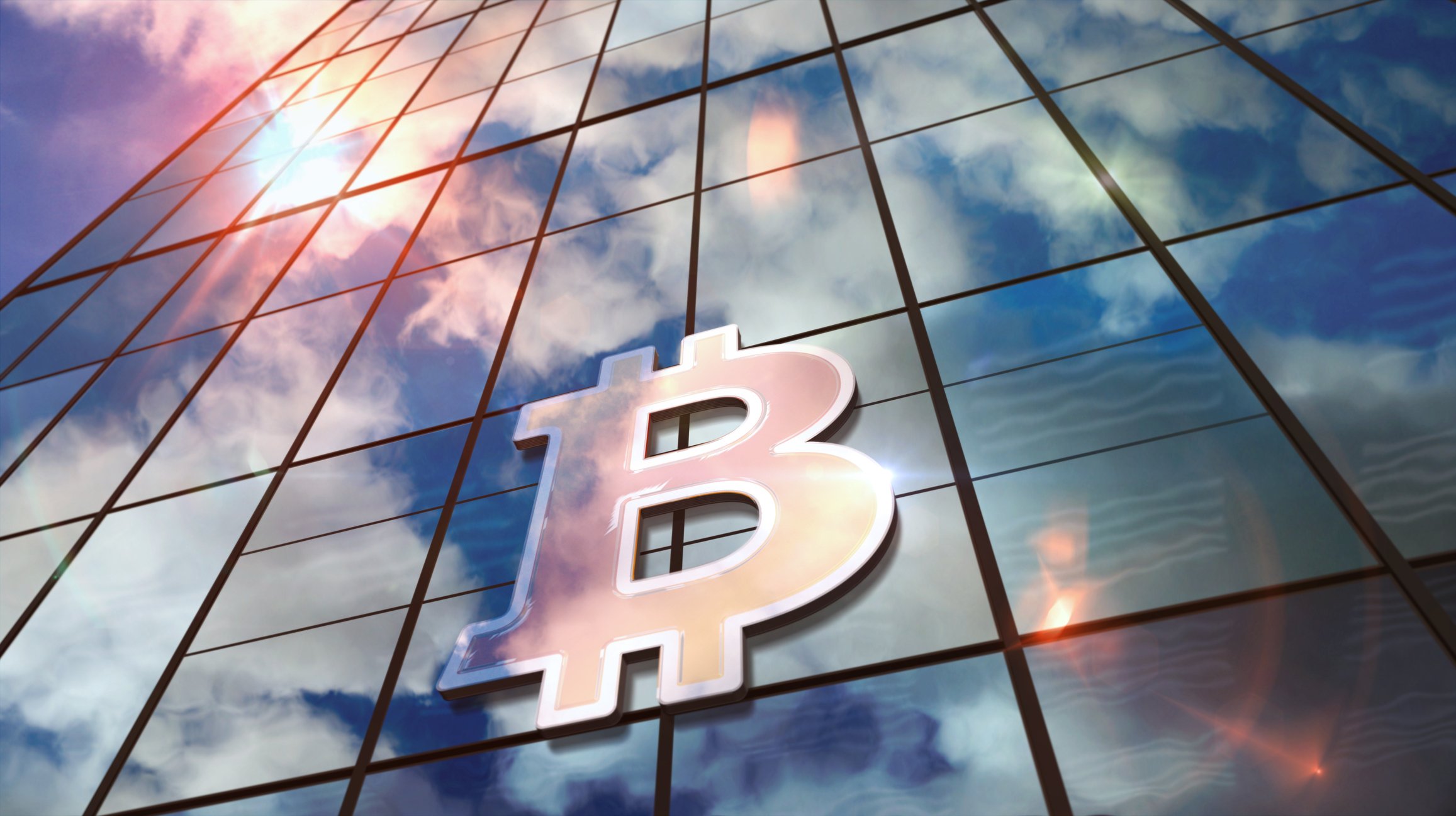 An office building with a Bitcoin symbol on it.