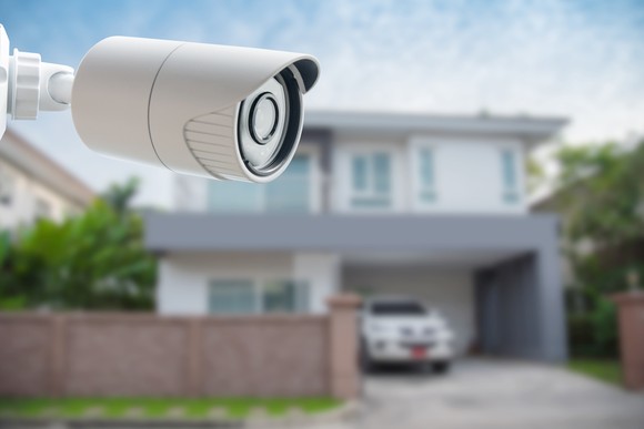 Security camera monitoring the exterior of a home