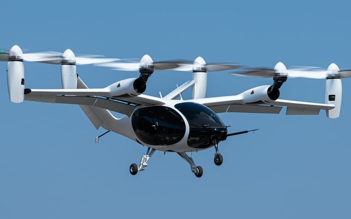 Joby Aviation's electronic air vehicle flying in the air with vertical take-off and landing.