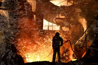 A person making steel.