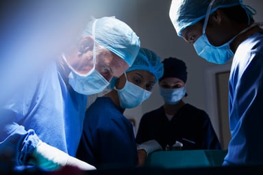 A surgery team works in the operating room