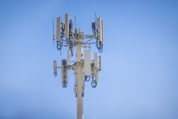 A 5G cell tower during the day.