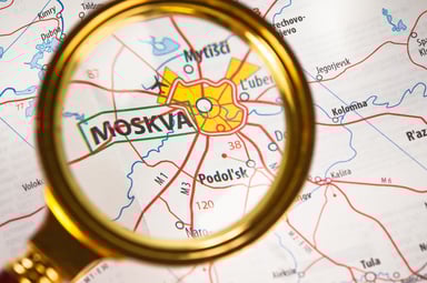 Map of Moscow under a magnifying glass.