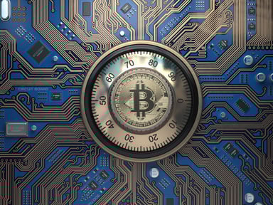bitcoin symbol on safe lock and circuit board