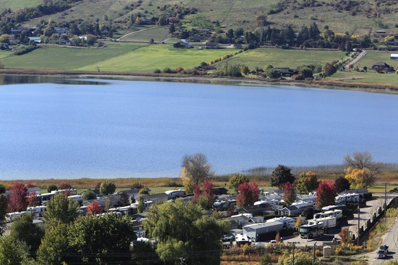 RV resort and mobile home community on lake.