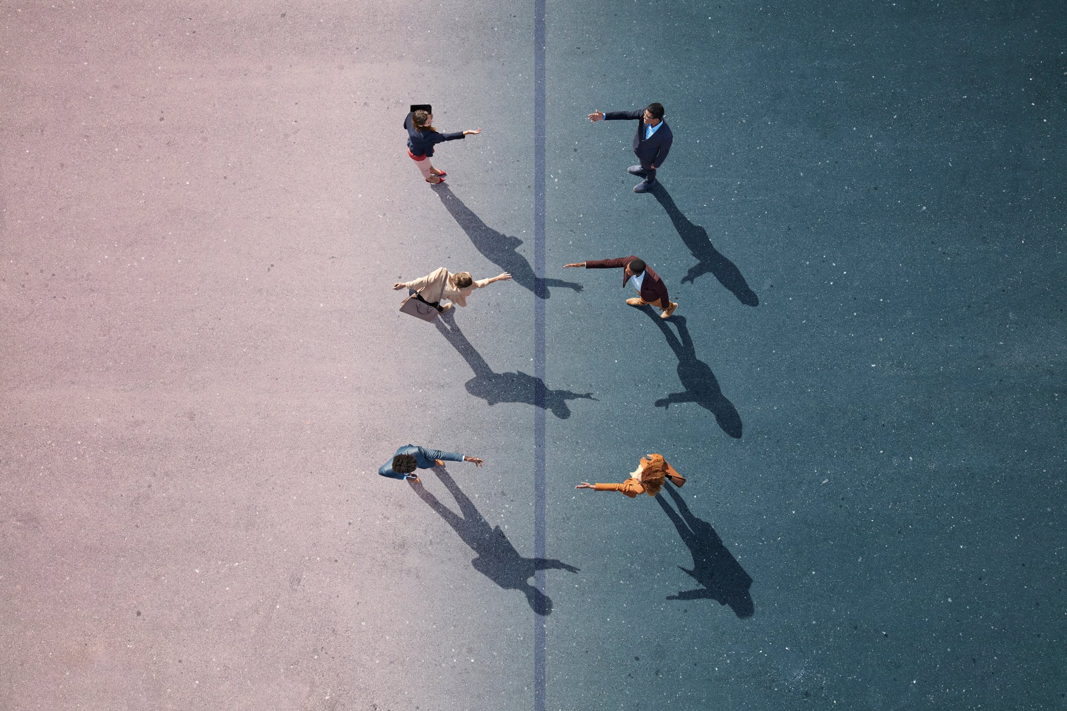 Three people holding out their hands to three people facing them.