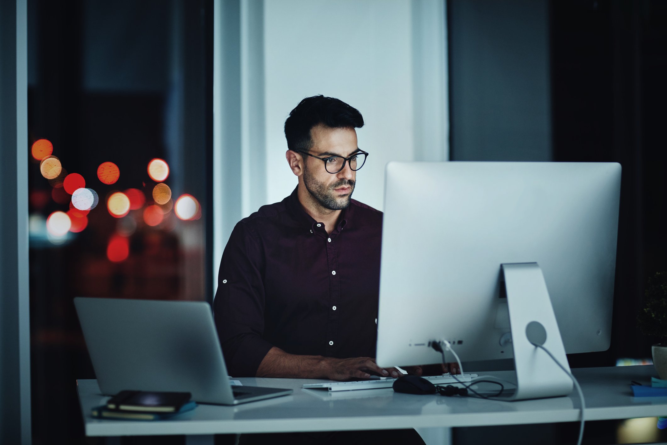 A person at a computer.