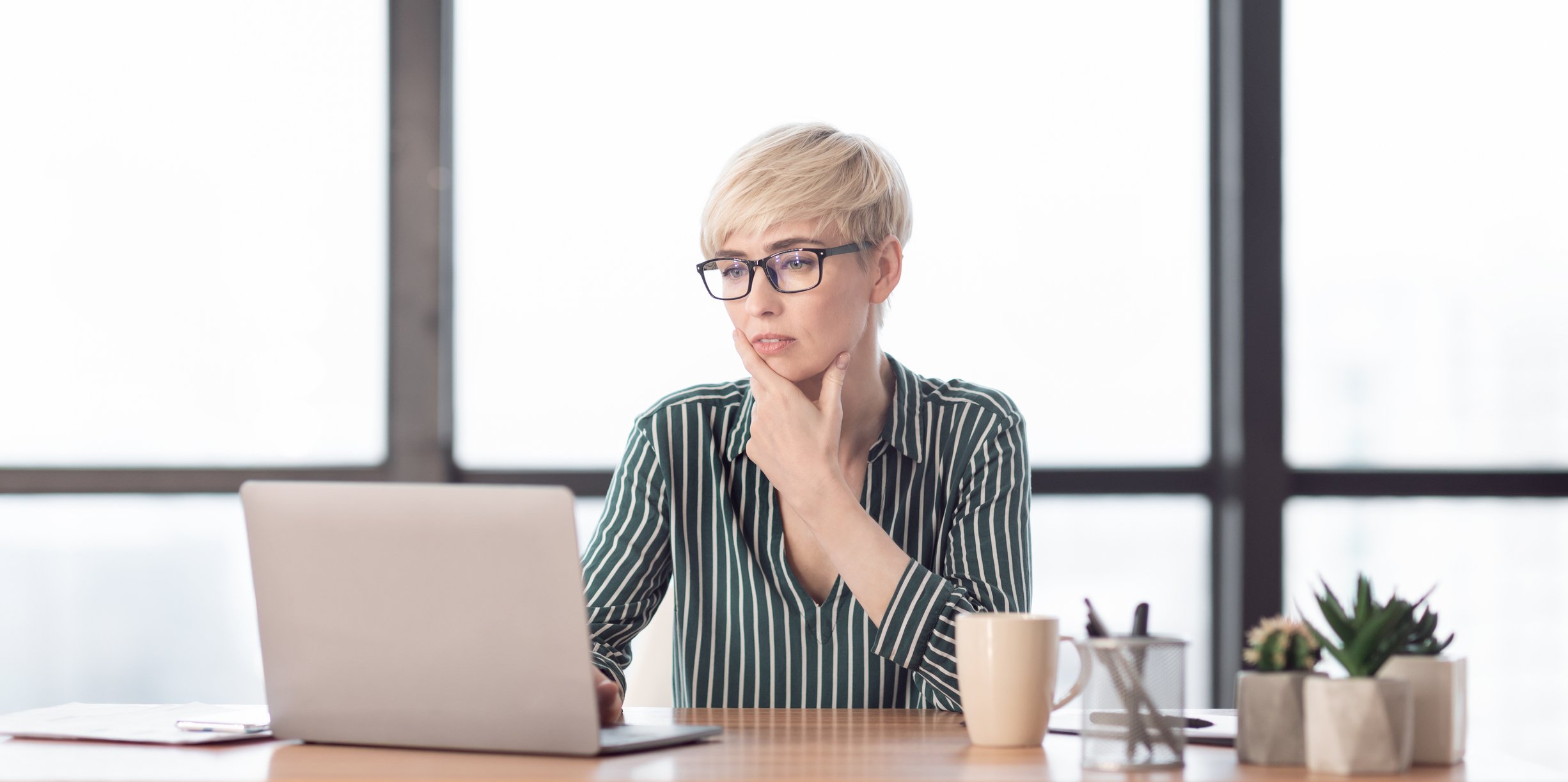A person at a laptop.