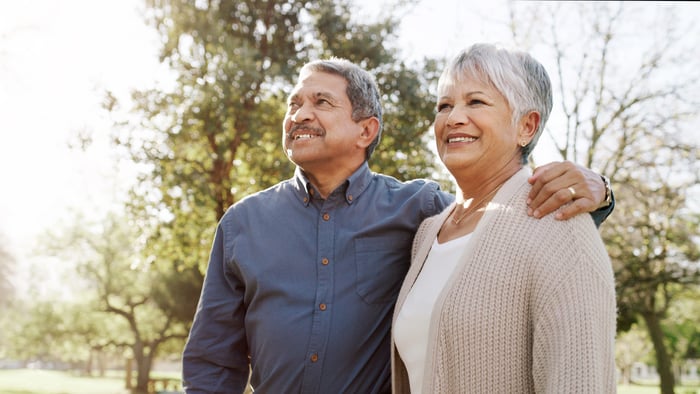 Two older people in nature.