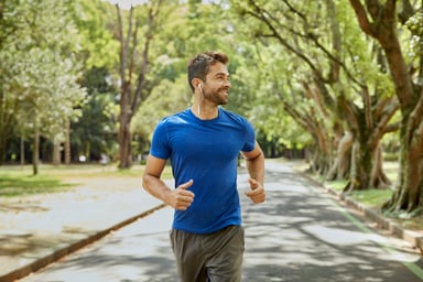 Man Jogging While Listening to Music