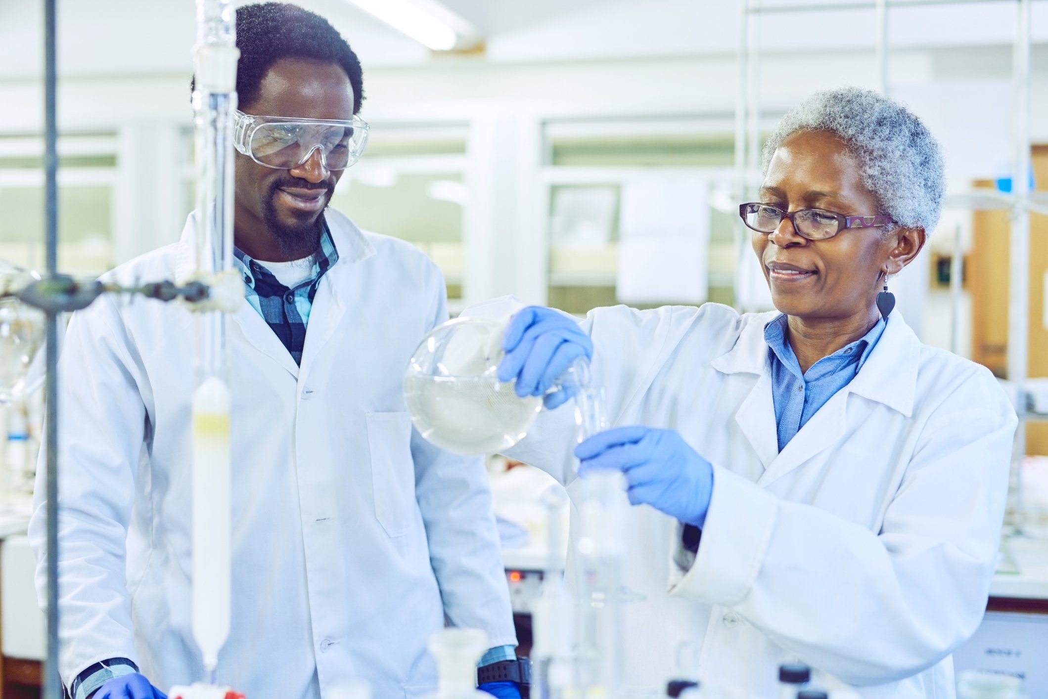 Two scientists working in a lab.