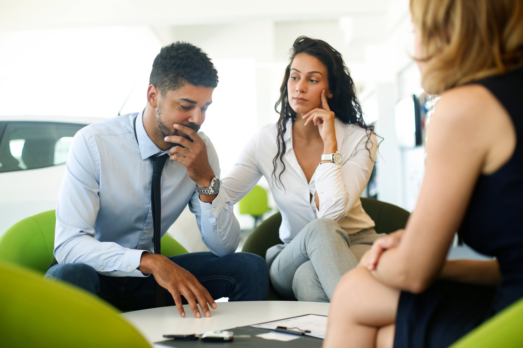 Two people considering offer.