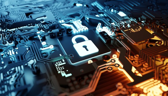 A digital padlock on a circuit board.