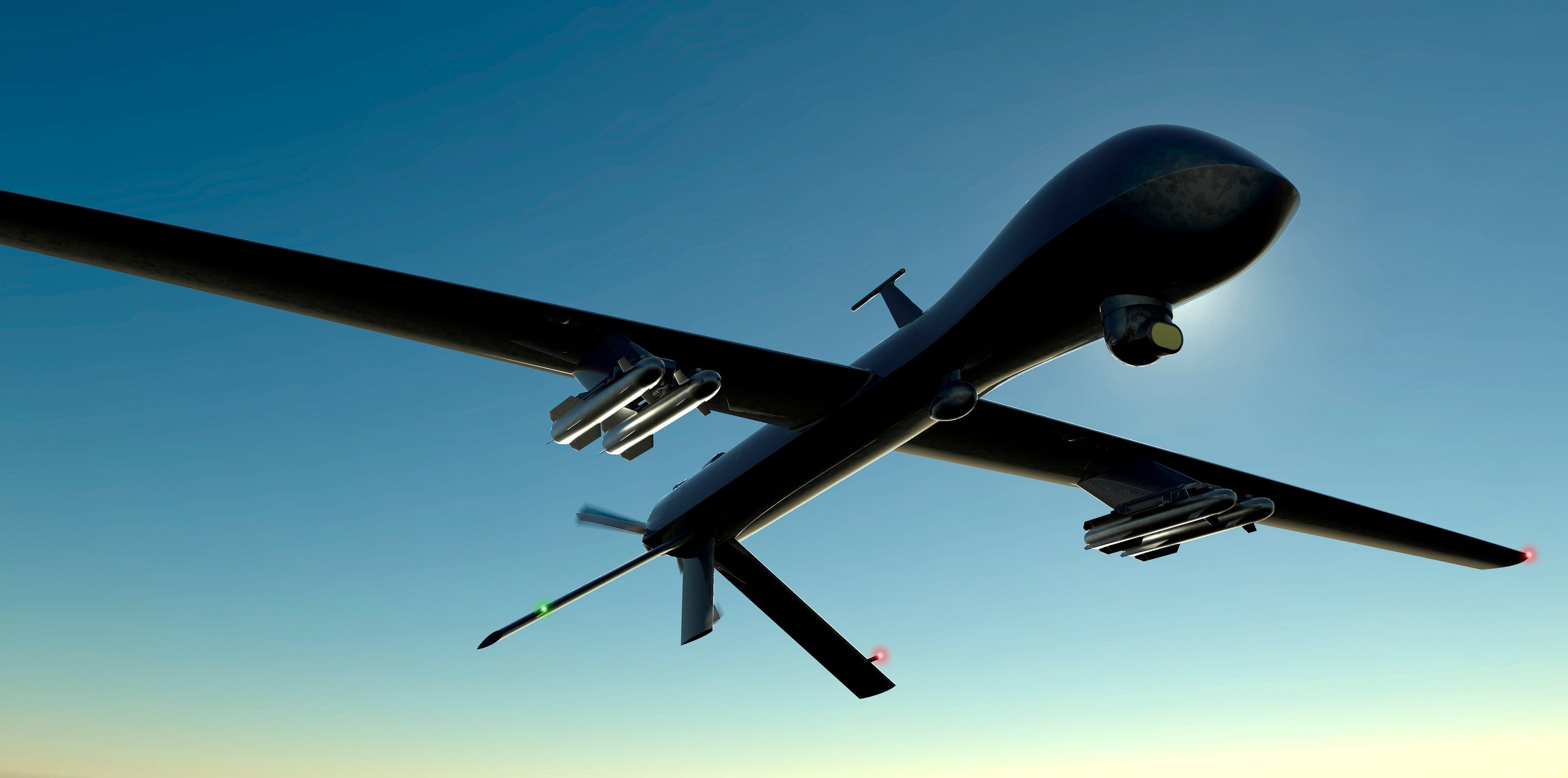 Combat drone in the sky.