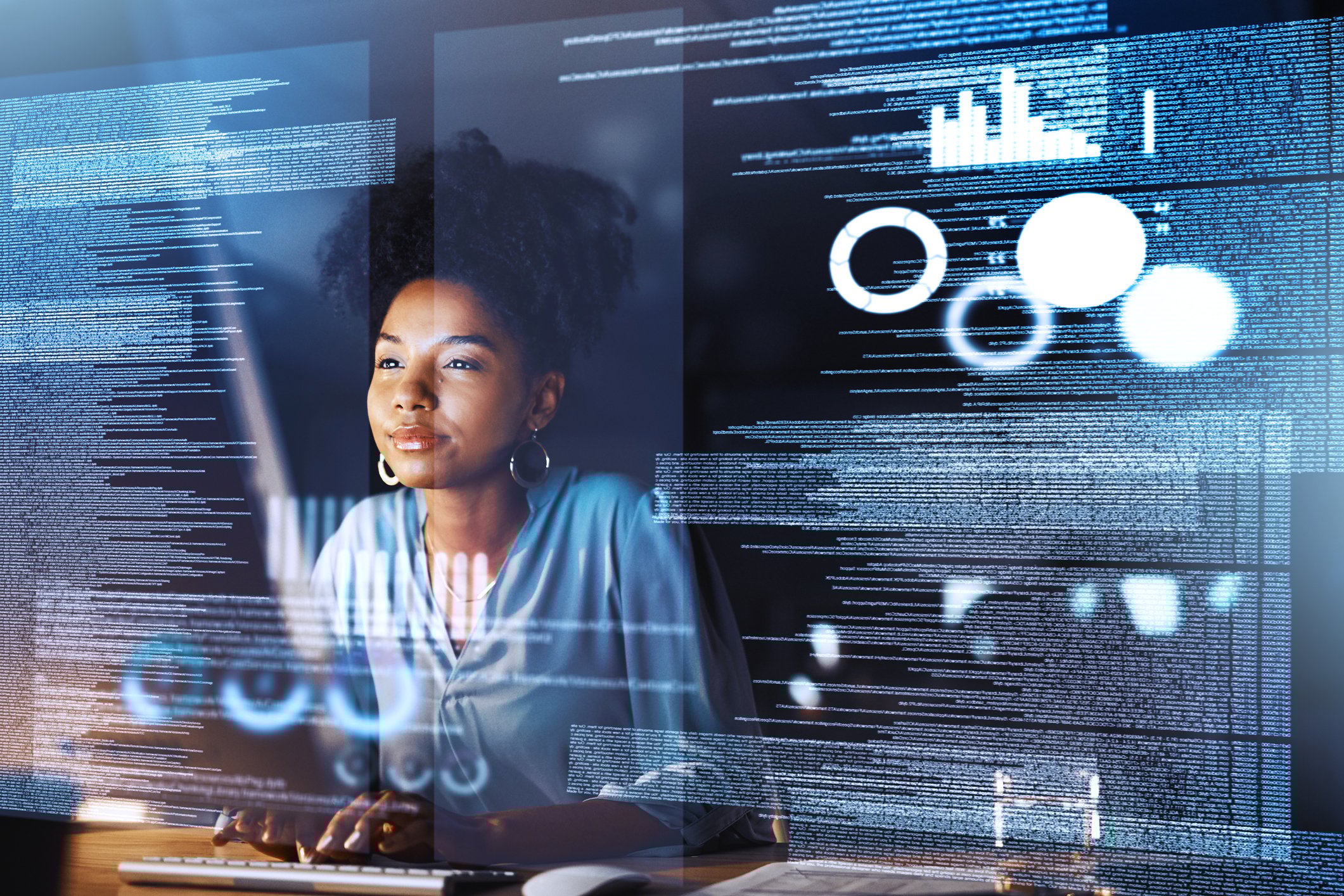 A software engineer works at a computer.