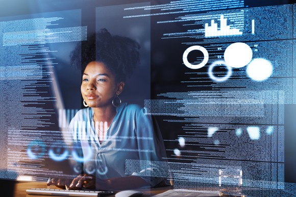 A software engineer works at a computer.