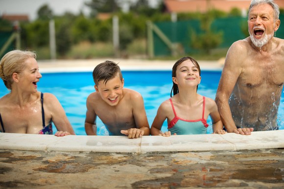 A family in a pool.
