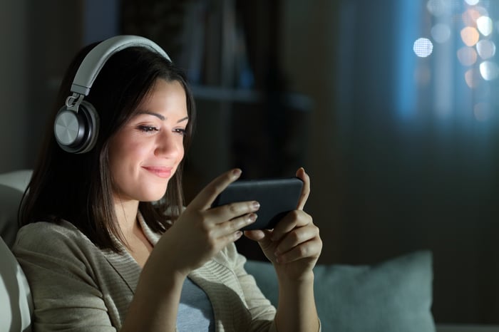 Young woman on headphones. 