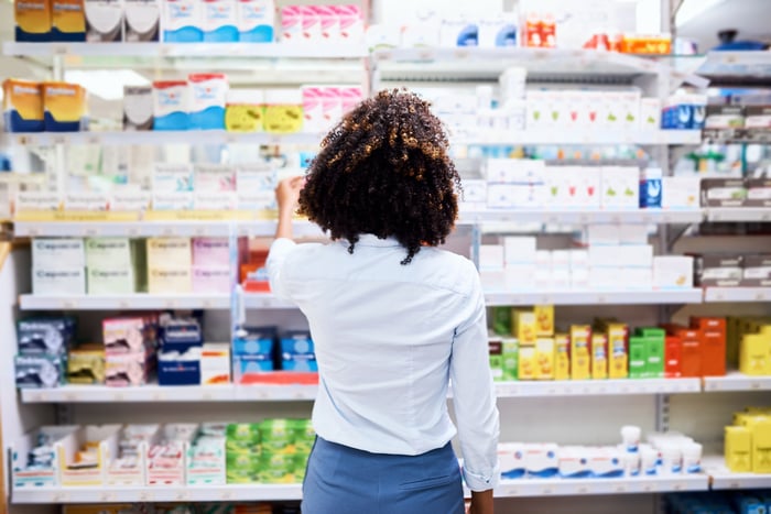 A person looking at products in a store.