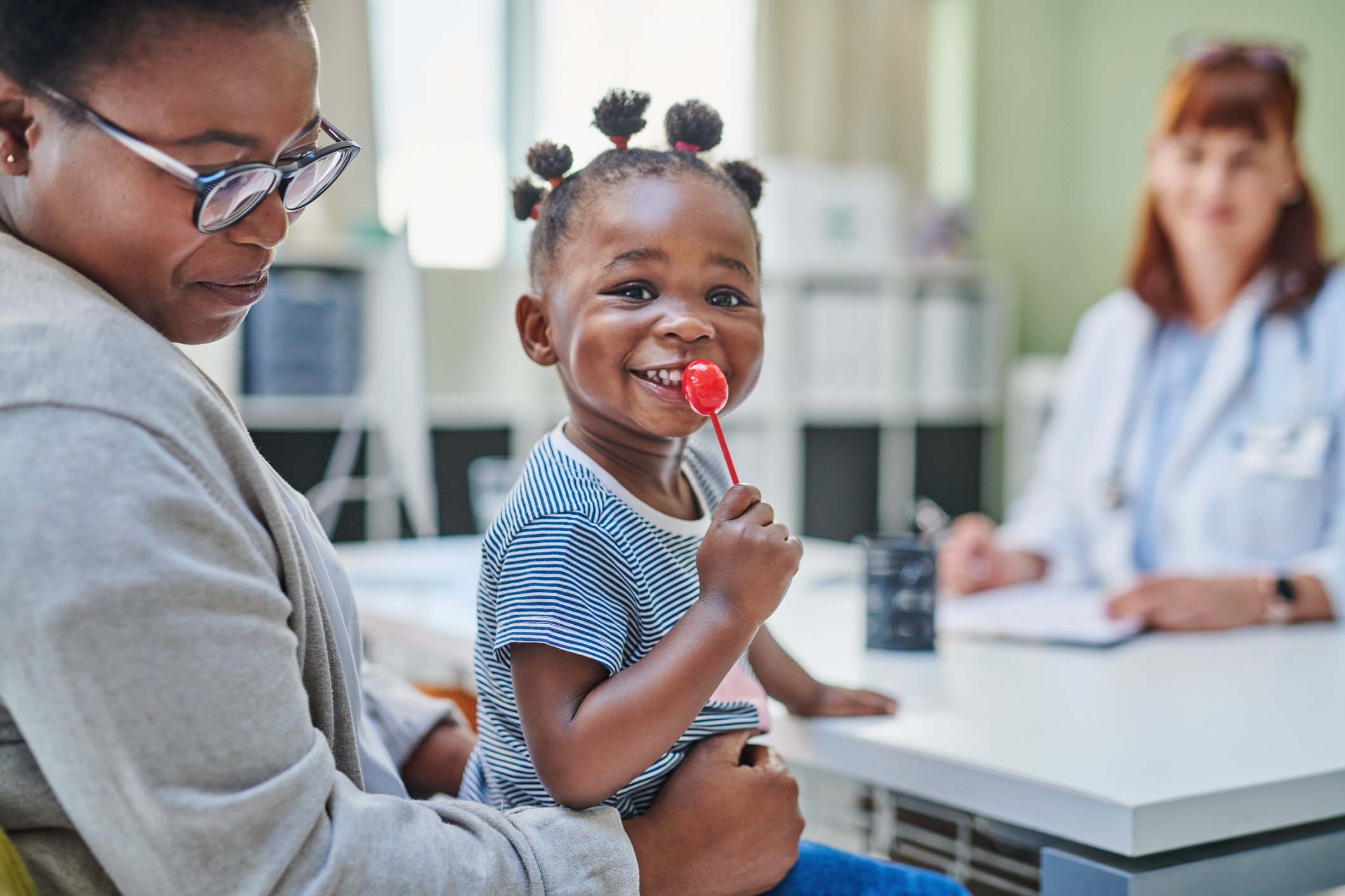 Child with a lollipop.