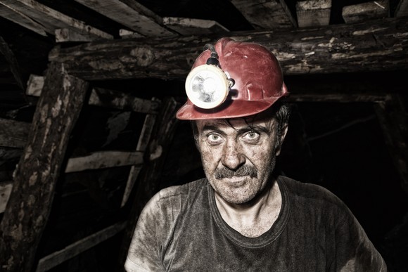 Coal miner in mine.
