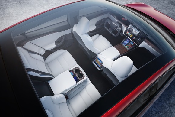 The interior of a Model S, viewed through the car's panoramic roof.