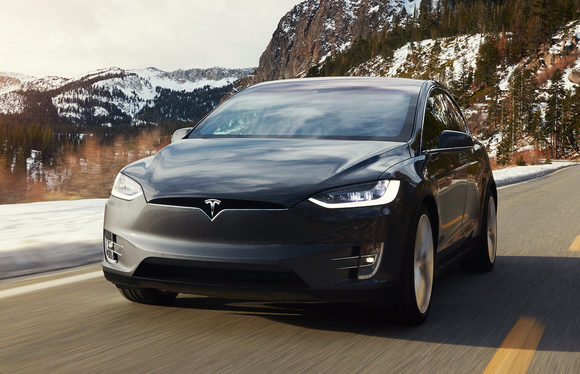 A gray car on the road.