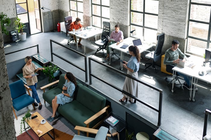 Workers in open, modern office.