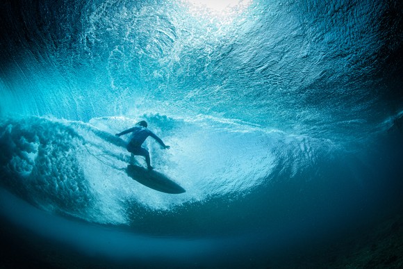 Surfer riding the waves.
