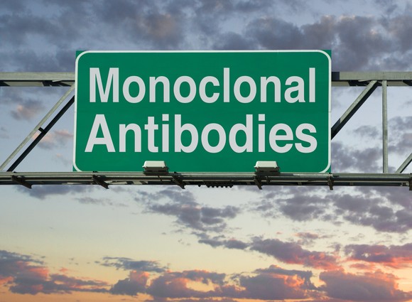 A sign with "Monoclonal Antibodies" printed on it.