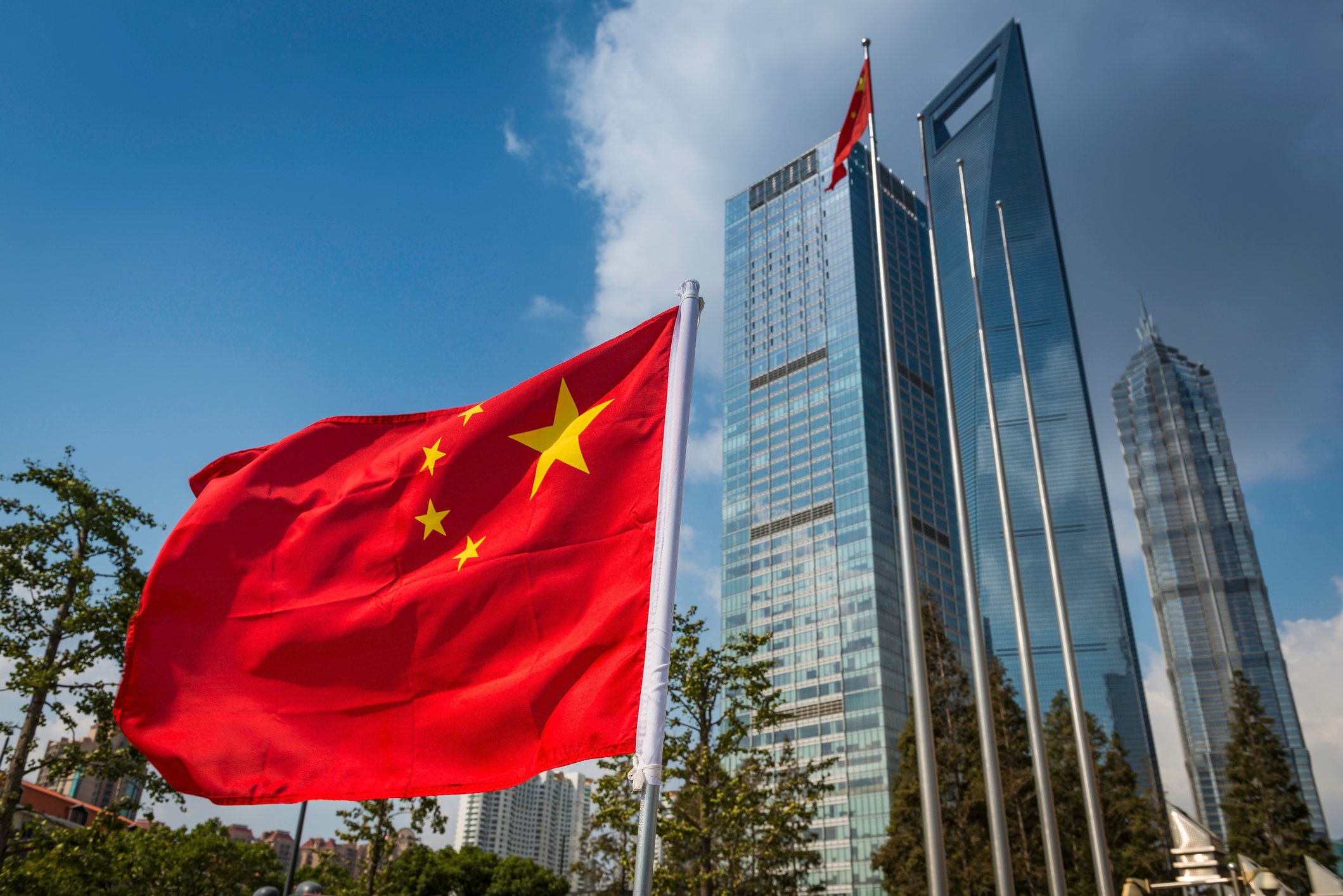 A Chinese flag flies in Pudong, Shanghai.