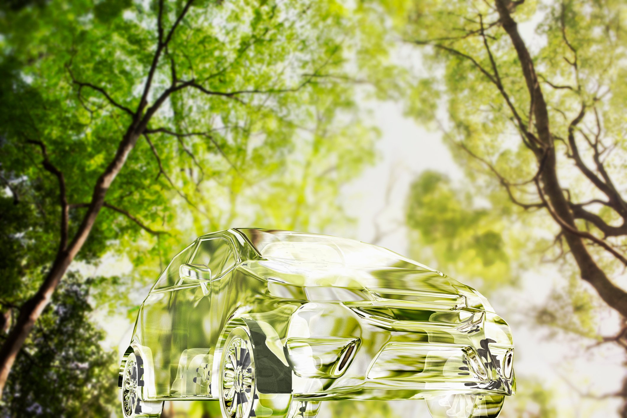 translucent car in forest representing electric car technology.