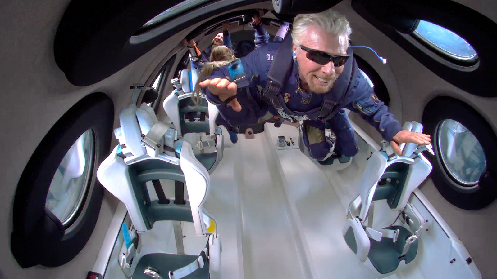 Richard Branson floating weightless in a Virgin Galactic spacecraft.