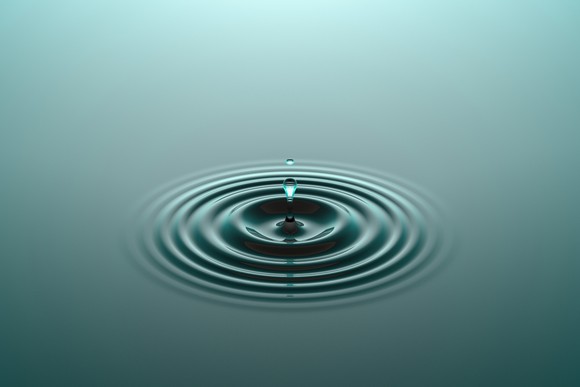 Water droplet making a ripple.