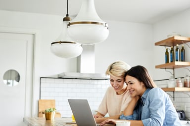 GettyImages-two women_use computer at home