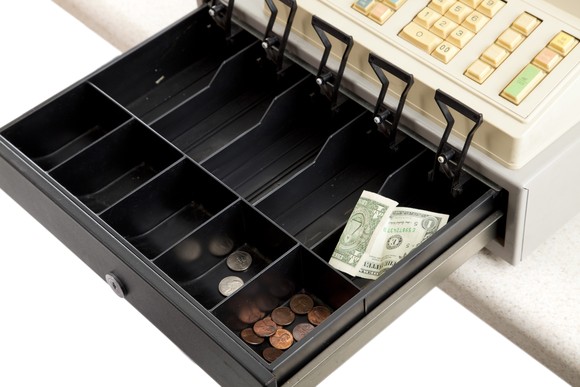 A nearly empty cash register.