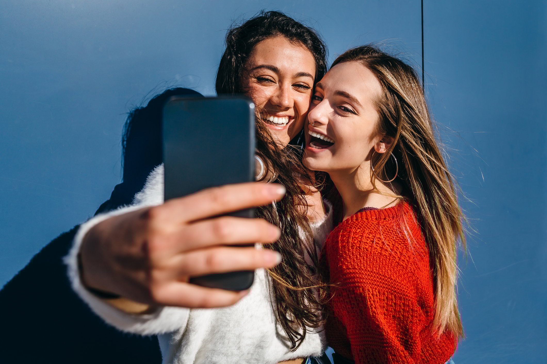 Two people taking a selfie together.