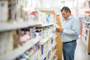 A customer shops at a pharmacy