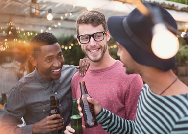 Group of people drinking together.