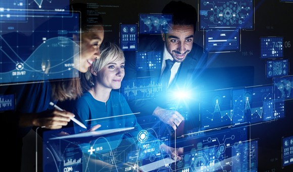 People working together analyzing data.